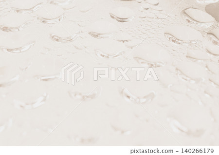 Top up abstract view of clean water drops and condensation steam on a transparent glass surface, creating a bright warm bubble texture backdrop or template Top up abstract view of clean water drops and condensation steam on a transparent glass surface, creating a bright warm bubble texture backdrop or template 140266179