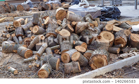 After storm.Pile of wooden logs from a felled tree. Firewood 140266583