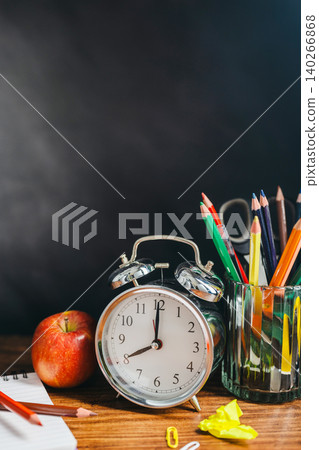 School stationery arrangement on wooden table, academic preparation concept 140266868