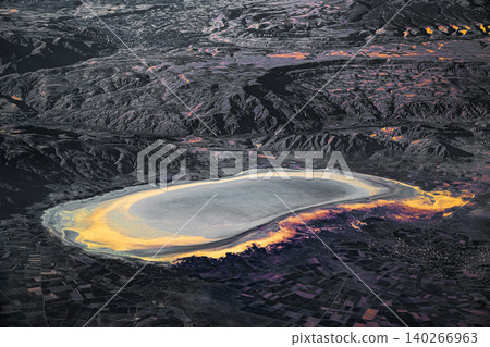 Aerial view of salt lake and surrounding landscape with abstract colors Aerial view of salt lake and surrounding landscape with abstract colors 140266963