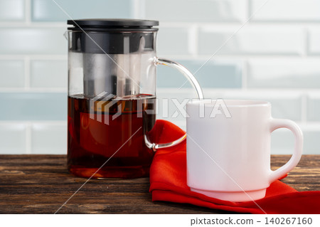 Tea served on a wooden kitchen table 140267160
