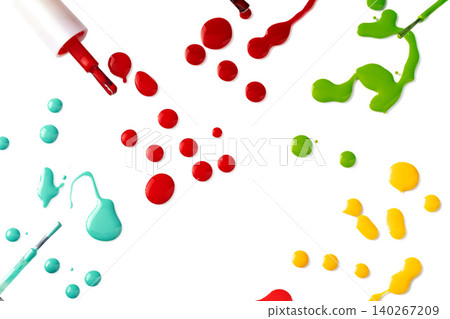 Drops of spilled nail polish over white background 140267209