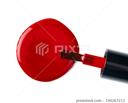 Close up of a nail polish puddle over white background Close up of a nail polish puddle over white background 140267211