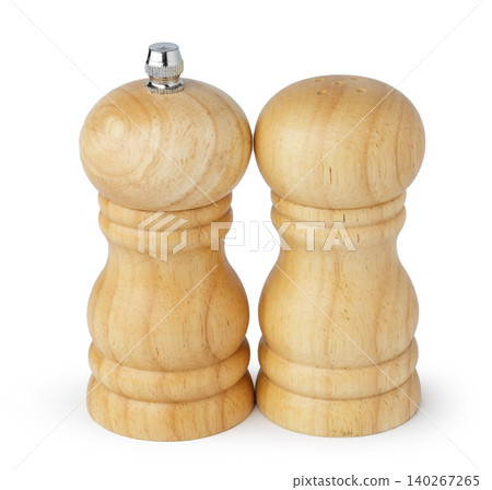 Wooden mills with salt and pepper on white Wooden mills with salt and pepper on white 140267265