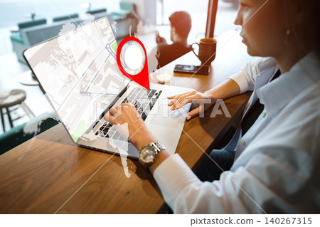 Person uses laptop to check taxi location on travel map in cafe at busy time Person uses laptop to check taxi location on travel map in cafe at busy time 140267315