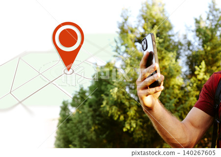 Finding location with a taxi app on a smartphone while exploring city streets Finding location with a taxi app on a smartphone while exploring city streets 140267605