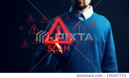 Man interacting with warning signs about scam calls in a dark setting Man interacting with warning signs about scam calls in a dark setting 140267753