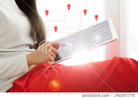 Exploring a taxi route on a tablet with a map and location markers Exploring a taxi route on a tablet with a map and location markers 140267779