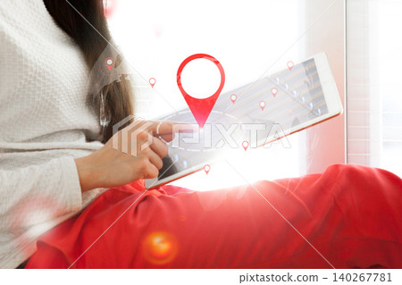 Tracking a taxi route on a tablet while planning a trip in a city Tracking a taxi route on a tablet while planning a trip in a city 140267781