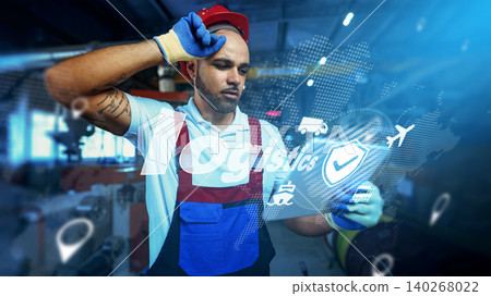 Worker in logistics checks tasks in a warehouse environment Worker in logistics checks tasks in a warehouse environment 140268022