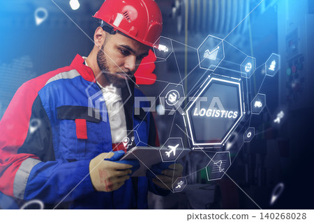 Worker manages logistics tasks with tablet in industrial setting at a busy warehouse Worker manages logistics tasks with tablet in industrial setting at a busy warehouse 140268028