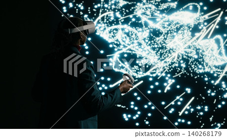 Optimizing AI neural network, virtual reality simulation and programmer adjusting data flow nodes. Manipulating artificial intelligence architecture,VR headset gear and computer scientist, camera B 140268179