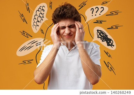 Young man holds head in frustration with background symbols of confusion and noise Young man holds head in frustration with background symbols of confusion and noise 140268249
