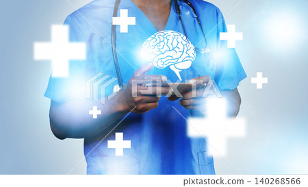 Health worker uses mobile device to monitor brain activity in a clinic setting Health worker uses mobile device to monitor brain activity in a clinic setting 140268566
