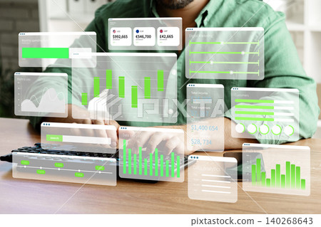 Using digital tools for business chart analysis in a modern workspace Using digital tools for business chart analysis in a modern workspace 140268643