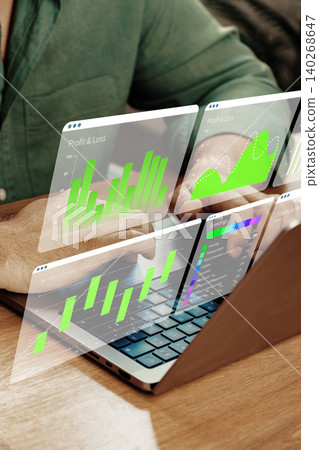 Digital business chart displaying profit and loss data on a laptop screen Digital business chart displaying profit and loss data on a laptop screen 140268647