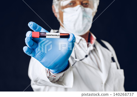 Researcher shows blood sample labeled hantavirus in laboratory setting Researcher shows blood sample labeled hantavirus in laboratory setting 140268737