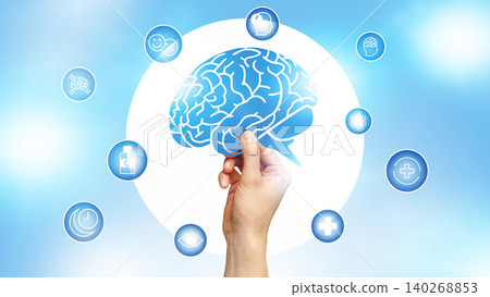 Hand holding a brain graphic with icons showing mental health and wellness 140268853