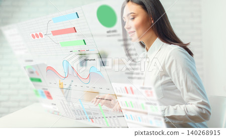 Analyzing digital business charts with AI in a modern workspace setting 140268915