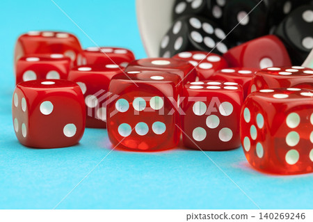 Gaming dices on blue background. Game concept. Gaming dices on blue background. Game concept. 140269246