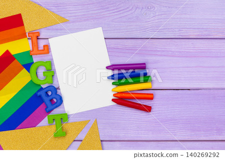 Gay pride flag on wooden table. creative photo. Gay pride flag on wooden table. creative photo. 140269292