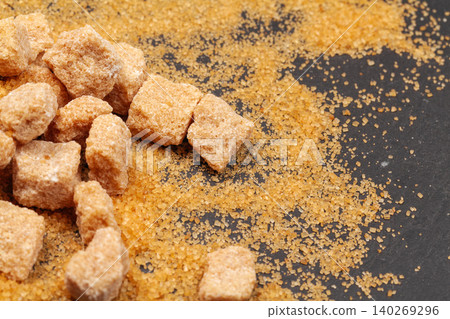 Rock sugar on dark background close up Rock sugar on dark background close up 140269296