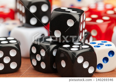 Dice on a wooden table. Concept for business risk. Dice on a wooden table. Concept for business risk. 140269346