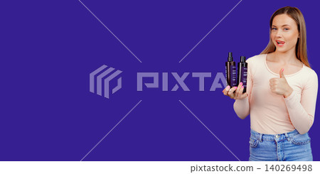Attractive young caucasian woman presenting cosmetic products bottles 140269498