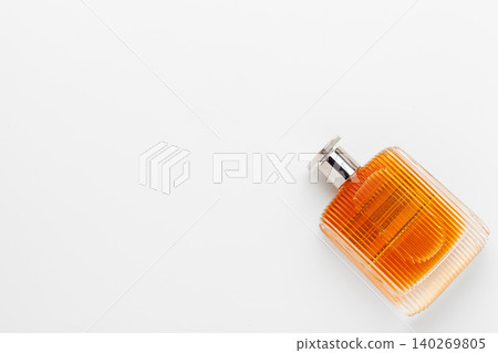 Perfume bottle isolated on white background. creative photo. Perfume bottle isolated on white background. creative photo. 140269805