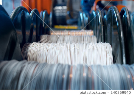 Production of copper wire, cable in reels at factory. Cable factory. Production of copper wire, cable in reels at factory. Cable factory. 140269940