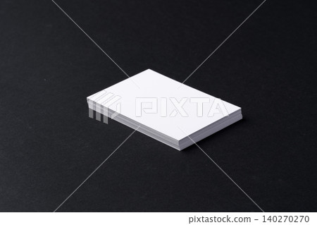 White blank business cards on dark black background White blank business cards on dark black background 140270270