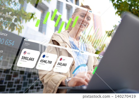 Business professional uses digital chart tools to analyze financial data outdoors 140270419