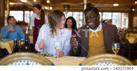 Portrait of a happy at a dinner in restaurant Portrait of a happy at a dinner in restaurant 140272905