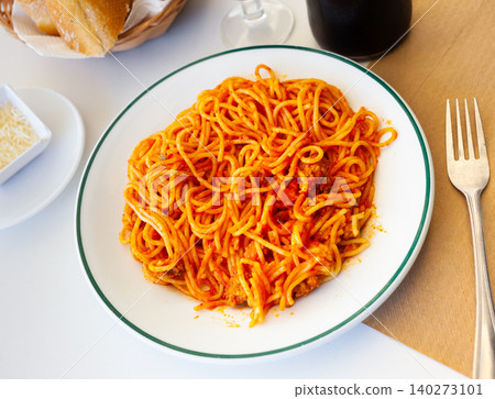 Popular Italian dish is Spaghetti bolognese Popular Italian dish is Spaghetti bolognese 140273101
