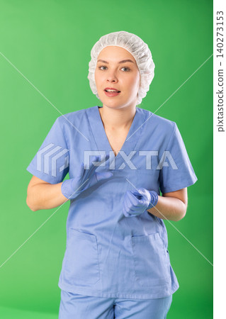 Positive young woman medic in white coat warning about prohibitions Positive young woman medic in white coat warning about prohibitions 140273153