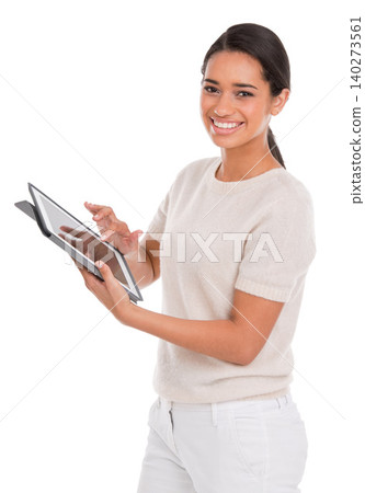 Woman, tablet and portrait in studio for online, research and e learning on college website. Smile of a student or model typing, scroll and education on digital technology and a white background Woman, tablet and portrait in studio for online, research and e learning on college website. Smile of a student or model typing, scroll and education on digital technology and a white background 140273561
