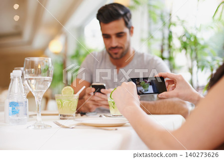 Restaurant, screen and couple taking picture, food and lunch with digital app and photograph. People, date or couple with cellphone or influencer with social media or love with Valentines day in cafe Restaurant, screen and couple taking picture, food and lunch with digital app and photograph. People, date or couple with cellphone or influencer with social media or love with Valentines day in cafe 140273626
