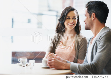 Smile, conversation and couple with coffee on date for romance or anniversary in cafeteria. Happy, love and young man and woman talking and drinking latte, espresso or cappuccino at restaurant. Smile, conversation and couple with coffee on date for romance or anniversary in cafeteria. Happy, love and young man and woman talking and drinking latte, espresso or cappuccino at restaurant. 140273744