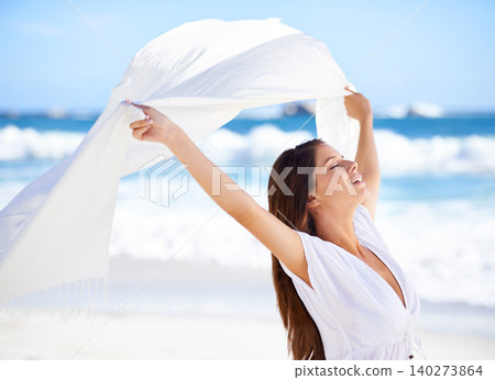 Sea, happy woman and fabric in wind at beach outdoor for summer, vacation and travel on holiday. Ocean, smile and person fly with silk sarong in the air for adventure, freedom or calm breeze by water Sea, happy woman and fabric in wind at beach outdoor for summer, vacation and travel on holiday. Ocean, smile and person fly with silk sarong in the air for adventure, freedom or calm breeze by water 140273864
