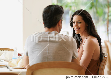 Couple, restaurant and conversation on date, love and bonding on valentines day. People, speaking and romance at cafe or smile for anniversary, together and happy at bistro on vacation or holiday Couple, restaurant and conversation on date, love and bonding on valentines day. People, speaking and romance at cafe or smile for anniversary, together and happy at bistro on vacation or holiday 140273882