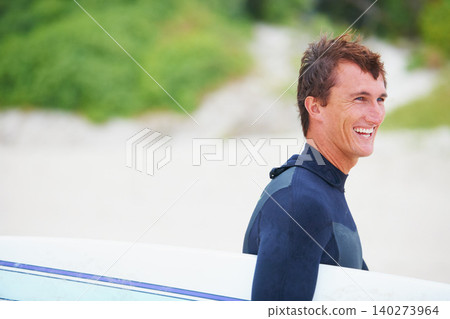Man, surfer and face or smile on beach with surfboard for adventure, vacation or holiday. Surfing, person and happy with travel in nature for exercise, water sports or mockup in summer with wetsuit Man, surfer and face or smile on beach with surfboard for adventure, vacation or holiday. Surfing, person and happy with travel in nature for exercise, water sports or mockup in summer with wetsuit 140273964