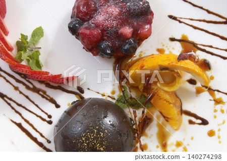 Chocolate dome cake and berries Chocolate dome cake and berries 140274298