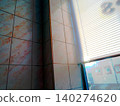 reflection in the windows of the office building 140274620