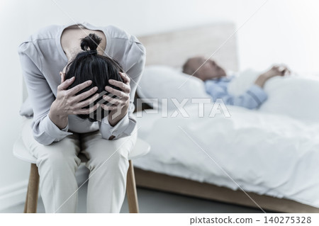 Women caring for the elderly suffer from caregiver burnout. Women caring for the elderly suffer from caregiver burnout. 140275328