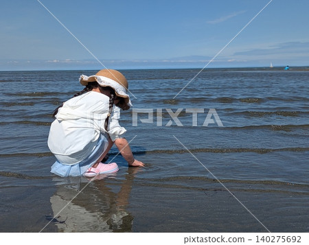 A girl on the beach 140275692