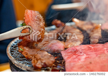 Yakiniku grilled over charcoal Yakiniku grilled over charcoal 140276002