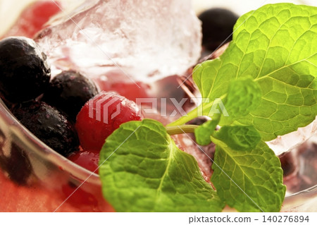 A refreshing berry iced drink with mint. A refreshing berry iced drink with mint. 140276894