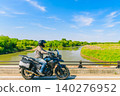 The Watarase River and a motorcycle as seen from Nowatari Bridge 140276952