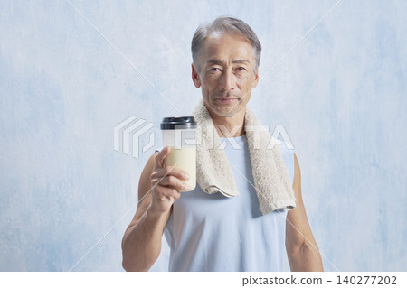 Senior man training with a protein bottle, looking at the camera Senior man training with a protein bottle, looking at the camera 140277202