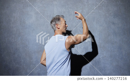 Senior man wearing sportswear posing Senior man wearing sportswear posing 140277216